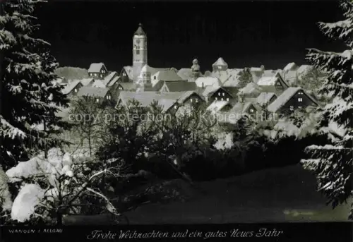 AK / Ansichtskarte Wangen Allgaeu Bayern Ortspanorama Kirchturm Nacht Schnee Winter Weihnachten Stadtsilhouette Tannen