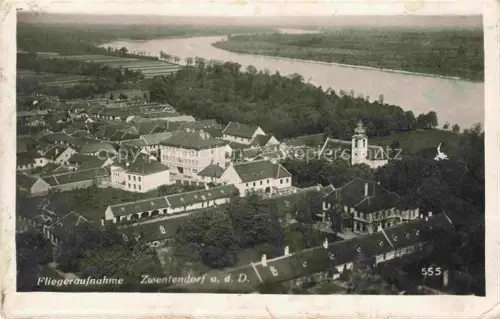 AK / Ansichtskarte Zwentendorf Donau Wiener Norden Niederoesterreich AT Donau Kirche Luftaufnahme Ortschaft Fluss Felder Baeume