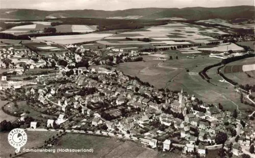 AK / Ansichtskarte Schmallenberg Hochsauerlandkreis NRW Luftaufnahme Schmallenberg Hochsauerland Kirche Dorf Felder Weststr Gasthof-Wuellner