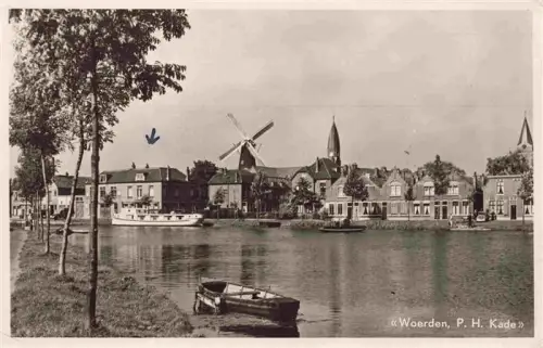 AK / Ansichtskarte Woerden Utrecht NL P-H-Kade Windmuehle Kanal Schiff Kirche Boot Ufer