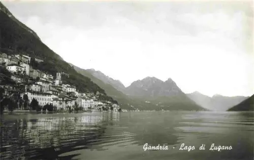 AK / Ansichtskarte Gandria Lago di Lugano TI Lago-di-Lugano Dorf Seeufer Haeuser Berge Wasser