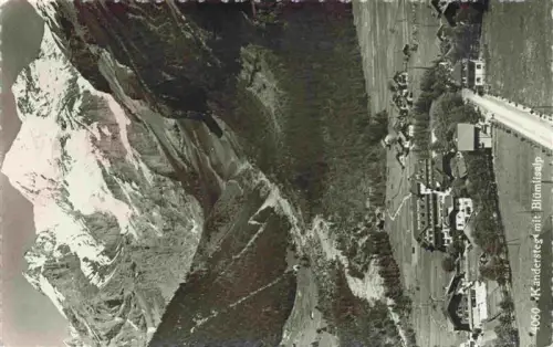 AK / Ansichtskarte Kandersteg BE Bluemlisalp Bergpanorama Tal Dorf Wiesen Alpen