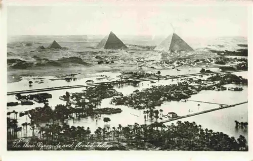 AK / Ansichtskarte Giza Gizeh Egypt Pyramiden Nilueberschwemmung ueberflutetes-Dorf Luftaufnahme Palmen Wueste Fliegeraufnahme