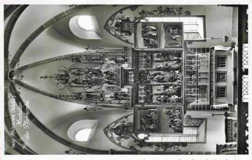 AK / Ansichtskarte Muenster Goms VS Hochaltar Pfarrkirche Retabel Gotik Schnitzwerk Gemaelde Kirchenraum