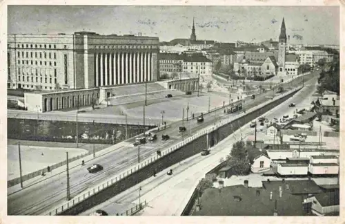 AK / Ansichtskarte HELSINKI Helsingfors Suomi Eduskuntatalo Riksdagshuset Parlamentsgebaeude Strasse Autos Kirche Stadtansicht