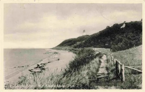 AK / Ansichtskarte Gilleleje Nakkehoved-Fyr Leuchtturm Strand Kueste Weg Strandweg Huegel