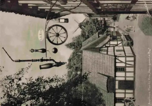 AK / Ansichtskarte Aarhus Arhus DK Den-gamle-By Freilichtmuseum Fachwerk Windmuehle Ladenzeichen Gasse