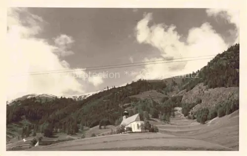 AK / Ansichtskarte Samedan Samaden GR Friedhofskapelle Kapelle Bergwald Huegel Wolken Wiesen Engadin