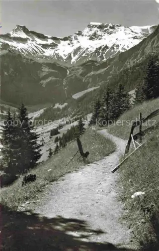 AK / Ansichtskarte Adelboden Frutigen BE Hoernliweg Wildstrubel Bergweg Tannen Zaun Berge Schnee Bergtal