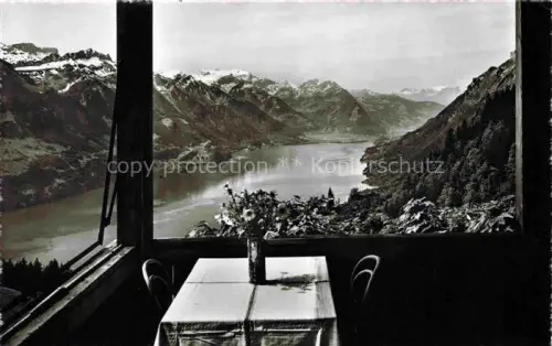 AK / Ansichtskarte Planalp 1350m Brienz BE Brienzersee Berge Terrasse Tisch Blumen Panorama Alpen