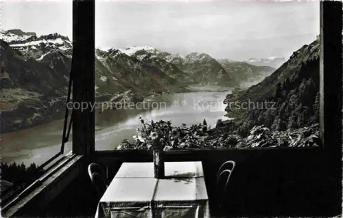 AK / Ansichtskarte Planalp 1350m Brienz BE Brienzersee Berge Terrasse Tisch Blumen Panorama Alpen