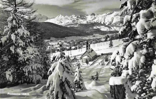 AK / Ansichtskarte Pontresina Maloja GR Ortschaft Kirche Schnee Berge Wald Tal Winter 1828m
