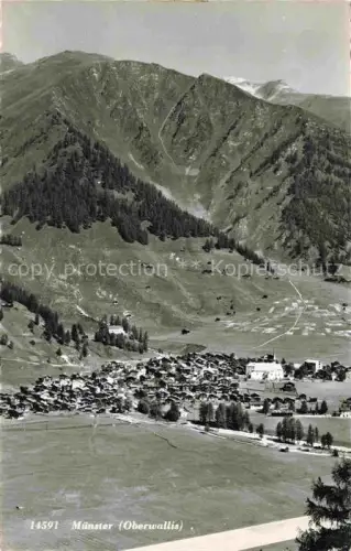 AK / Ansichtskarte Muenster Goms VS Oberwallis Goms Bergdorf Talansicht Wiesen Wald Berge Siedlung