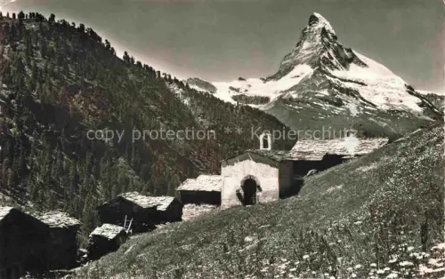 AK / Ansichtskarte ZERMATT VS Findeln Matterhorn Kapelle Bergweiler Holzhaeuser Blumenwiese Wald