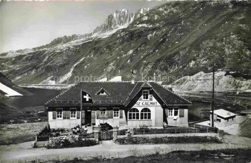 AK / Ansichtskarte Piz Calmot 2048m Andermatt UR Restaurant-Piz-Calmot Oberalppasshoehe Oberalpsee Staudamm Berge Passhoehe