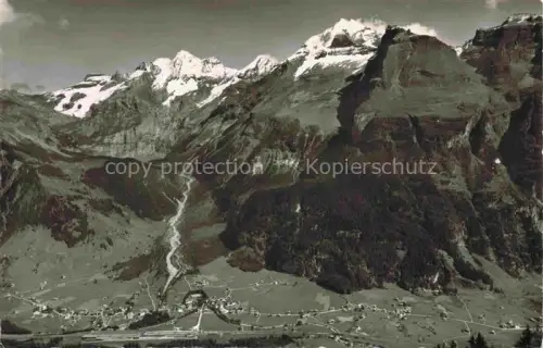 AK / Ansichtskarte Kandersteg BE Bluemlisalp Doldenhorn Bergdorf Alpenpanorama Schneeberge Felsen Wasserfall