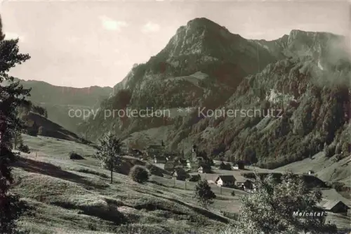 AK / Ansichtskarte Melchtal Melchthal OW Dorf Kirche Berge Waelder Wiesen Tallandschaft