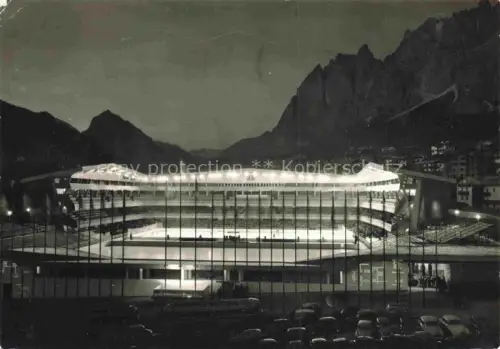 AK / Ansichtskarte Cortina d Ampezzo Veneto IT Stadio-Olimpico-del-Ghiaccio Eisstadion Nachtaufnahme Dolomiten Wintersport Olympia