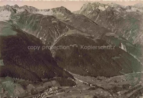 AK / Ansichtskarte Disentis GR Fliegeraufnahme Tal Wald Dorf Berge Alpen Surselva