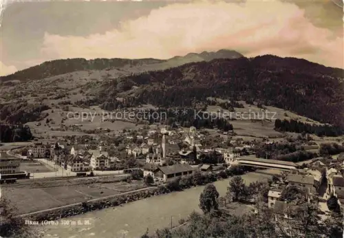 AK / Ansichtskarte Ilanz Jlanz Glion GR Panorama Fluss Berge Wald Kirchturm Felder Ortschaft