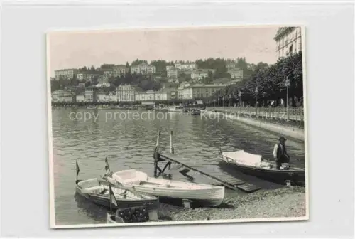 AK / Ansichtskarte LUGANO Lago di Lugano TI Lago-di-Lugano Ruderboote Promenade Uferpromenade Seeufer Boote Fischer Stadtpanorama