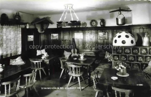 AK / Ansichtskarte Sonnwendalm Steinach Tirol Brenner AT Gaststube Kachelofen Gitarre Almhuette Holzmoebel Interieur Kronleuchter
