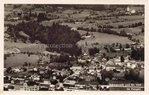AK / Ansichtskarte Schwarzach St-Veit Pongau AT St-Veit Pongau Ort Felder Wald Kirche Haeuser