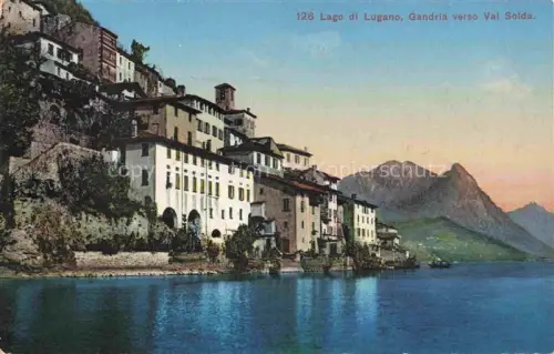 AK / Ansichtskarte Gandria Lago di Lugano TI Lago-di-Lugano Seeufer Haeuser Berge Val-Solda Handkoloriert