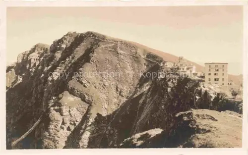 AK / Ansichtskarte Monte-Generoso 1704m Lugano TI Monte-Generoso-Kulm Felsen Berghotel Gipfel Felsgrat S/W-Fotografie