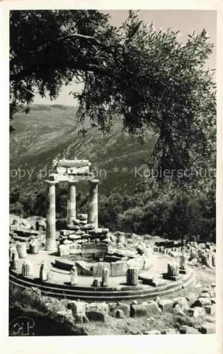 AK / Ansichtskarte Delphi Delfi Greece Tholos Athena-Pronaia Ruinen Antike Saeulen Olivenbaum Berge