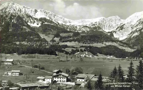 AK / Ansichtskarte Scheffau am Wilden Kaiser Tirol AT Luftkurort Wilder-Kaiser Panorama Dorf Kirchturm Bergmassiv Tirol Alpen