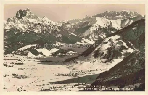 AK / Ansichtskarte Tannheim 1097m Tirol AT Tannheimertal Rote-Flueh Gimpel Zugspitze Winter Schnee Wintersportplatz Panorama Tal