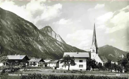 AK / Ansichtskarte Muenster Tirol AT Kirche Kirchturm Dorf Berge Inntal Haeuser Wiesen