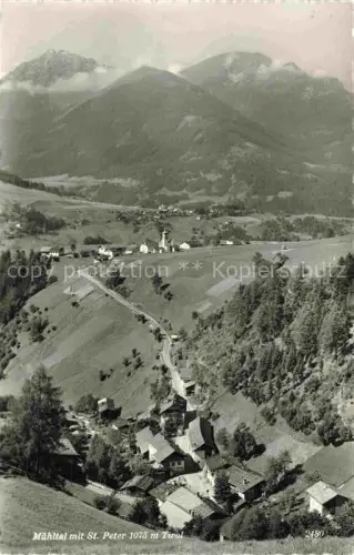AK / Ansichtskarte Muehltal Wildschoenau Tirol AT Muehltal Tal Dorfkirche Bergpanorama Alpendorf Wiesen Wald