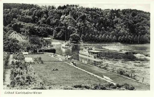 AK / Ansichtskarte Bad Karlshafen Bad Carlshafen Kassel Hessen Weser Dampfer Fluss Parkanlage Promenade Wald Turm Solbad