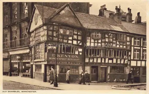 AK / Ansichtskarte MANCHESTER  UK Old-Shambles Fachwerk Antiquitaeten Weinhandlung Passanten Strassenszene