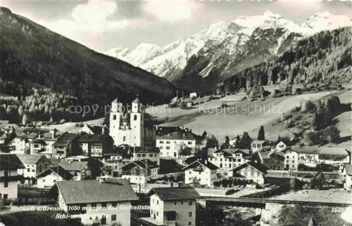 AK / Ansichtskarte Steinach Brenner Tirol AT Gschnitztal Brenner Berg Kirche Doppelturm Stadtpanorama Berge Schnee Wald Skigebiet