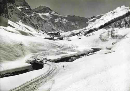 AK / Ansichtskarte Fextal Val Fex Sils Maria GR Piz-Tremoggia Fexgletscher Winterlandschaft Schnee Berge Bach Bruecke