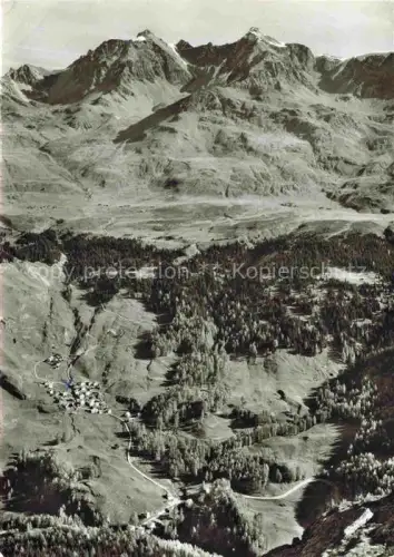 AK / Ansichtskarte Sur Albula GR Alp-Flix Piz-Calderas Fliegeraufnahme Oberhalbstein Alpendorf Wald Berge