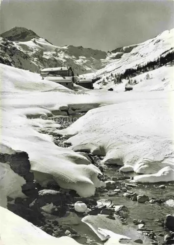 AK / Ansichtskarte Fex GR Piz-Tremoggia Winterlandschaft Bach Schnee Alpenbach Berghuetten Ober-Engadin