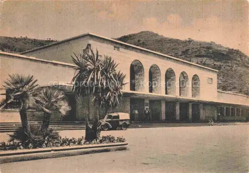 AK / Ansichtskarte Vintimille Ventimiglia Liguria IT Stazione-Ferroviaria Bahnhof Palmen LKW Arkaden Riviera-dei-fiori Fahrzeug