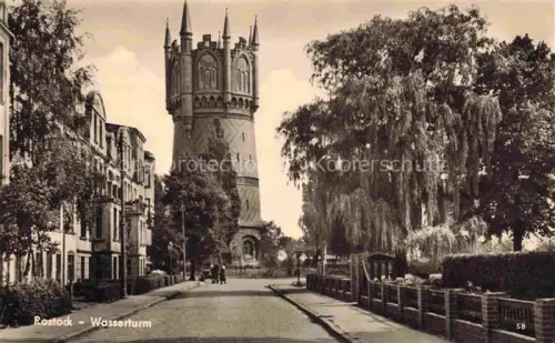 AK / Ansichtskarte ROSTOCK  CITY Wasserturm Strasse Wohngebaeude Baeume Buergersteig