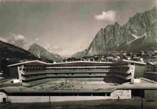 AK / Ansichtskarte Cortina d Ampezzo Veneto IT Stadio-Olimpico-del-Ghiaccio Eisstadion Olympia Dolomiten Berge Ortschaft S/W