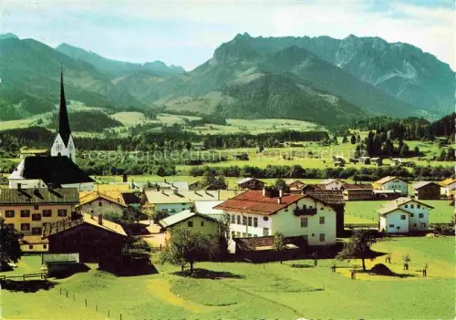 AK / Ansichtskarte Koessen Tirol AT Zahmer-Kaiser Kirche Dorf Bergpanorama Wiesen Luftkurort