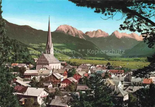 AK / Ansichtskarte Imst Tirol AT Pfarrkirche Stadtansicht Bergpanorama Tal Haeuser Baeume