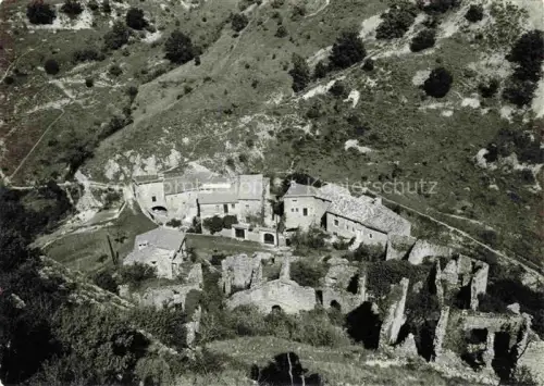 AK / Ansichtskarte Ruoms Largentiere 07 Ardeche Ruinen Steingebaeude Felshang Dorf Baeume Berglandschaft