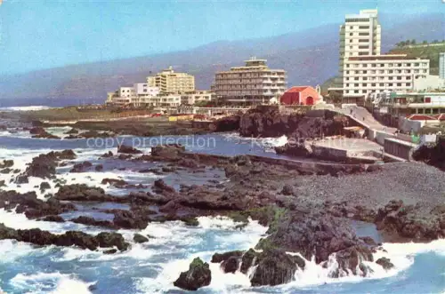 AK / Ansichtskarte Puerto-de-la-Cruz Tenerife ES San-Elmo Kueste Lavafelsen Meer Hotel Hochhaus Brandung