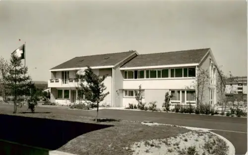 AK / Ansichtskarte BueLACH  ZH Soldatenhaus CVJM Schweizer-Flagge Wohngebaeude Rasenflaeche Pfingstlager