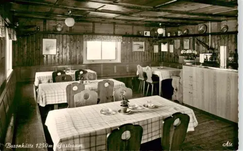 AK / Ansichtskarte Buronhuette 1250m Wertach Bayern Buronhuette Gastraum Gaststube Holzvertaefelung Tische Stuehle Berghuette Allgaeu