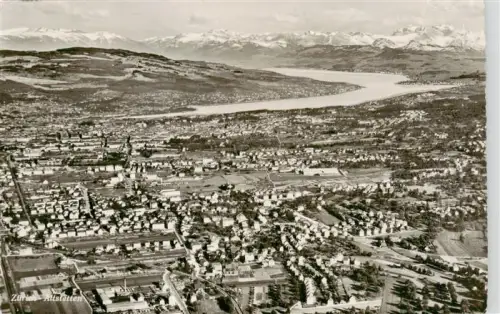 AK / Ansichtskarte Altstetten  Zuerich ZH Zuerichsee Alpen Stadtansicht Wohnquartier Bahnlinie Panorama